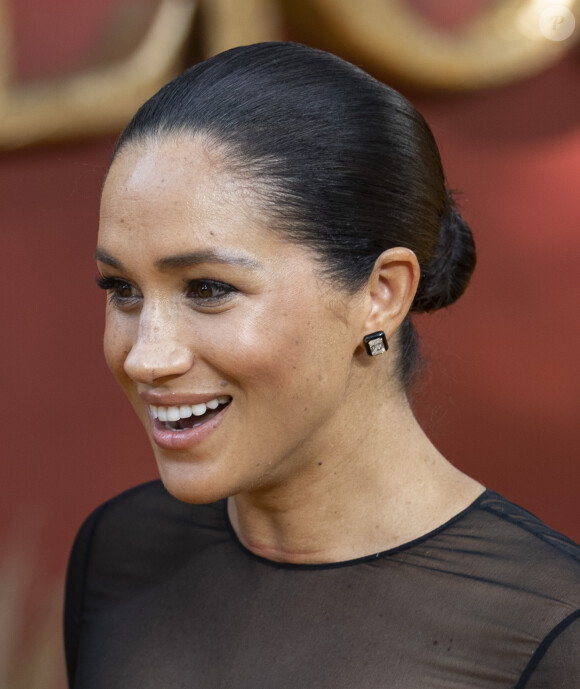 Le prince Harry, duc de Sussex, et Meghan Markle, duchesse de Sussex, à la première du film "Le Roi Lion" au cinéma Odeon Luxe Leicester Square à Londres, le 14 juillet 2019.