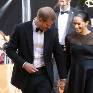 Le prince Harry, duc de Sussex, et Meghan Markle, duchesse de Sussex, à la première du film "Le Roi Lion" au cinéma Odeon Luxe Leicester Square à Londres, le 14 juillet 2019.