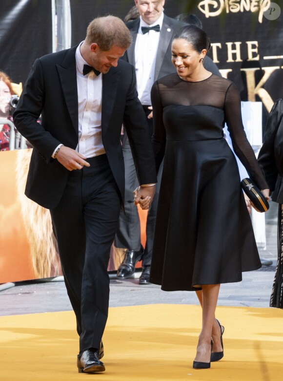 Le prince Harry, duc de Sussex, et Meghan Markle, duchesse de Sussex, à la première du film "Le Roi Lion" au cinéma Odeon Luxe Leicester Square à Londres, le 14 juillet 2019.