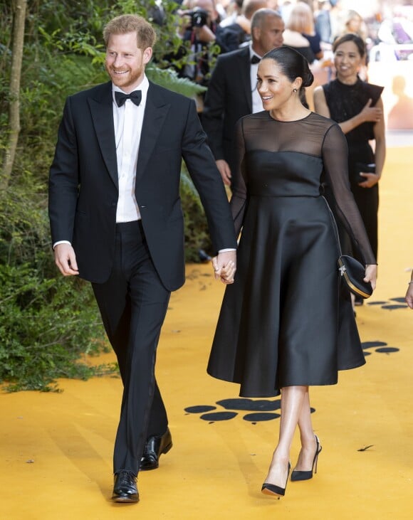 Le prince Harry, duc de Sussex, et Meghan Markle, duchesse de Sussex, à la première du film "Le Roi Lion" au cinéma Odeon Luxe Leicester Square à Londres, le 14 juillet 2019.