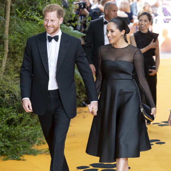 Le prince Harry, duc de Sussex, et Meghan Markle, duchesse de Sussex, à la première du film "Le Roi Lion" au cinéma Odeon Luxe Leicester Square à Londres, le 14 juillet 2019.