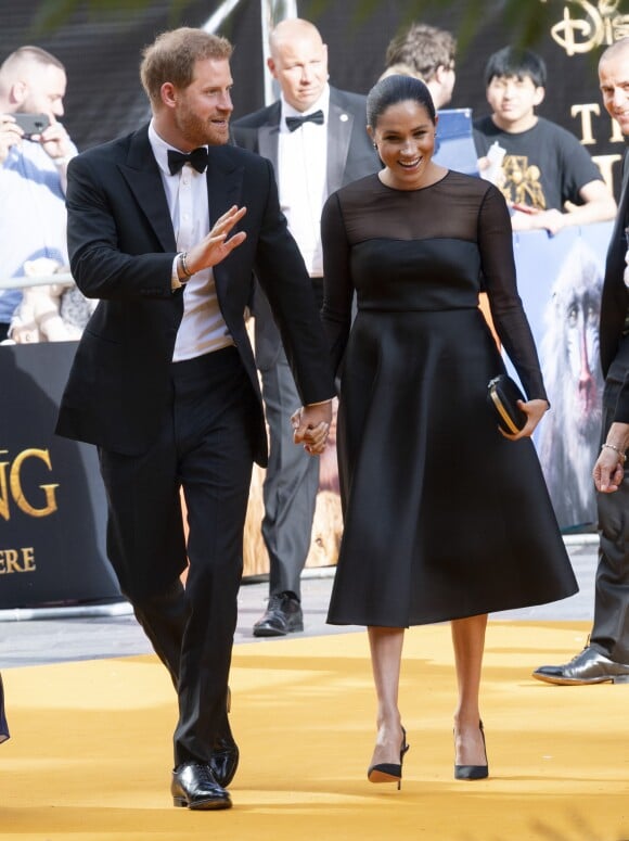 Le prince Harry, duc de Sussex, et Meghan Markle, duchesse de Sussex, à la première du film "Le Roi Lion" au cinéma Odeon Luxe Leicester Square à Londres, le 14 juillet 2019.