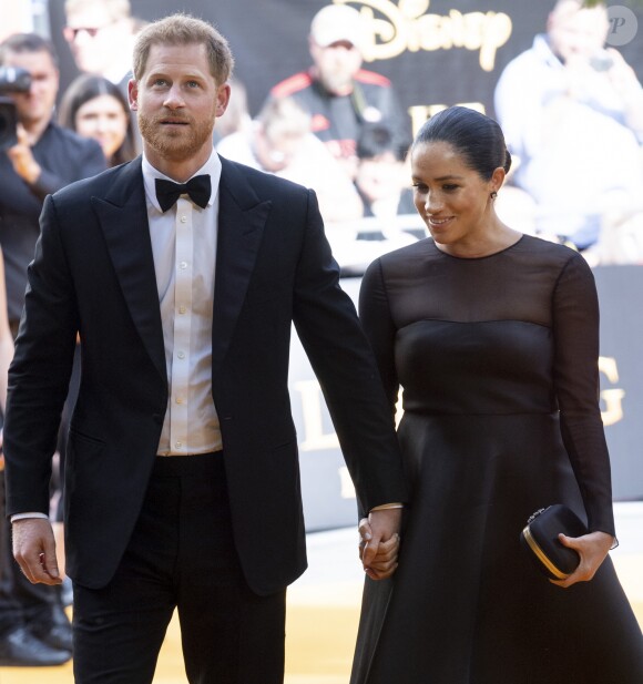 Le prince Harry, duc de Sussex, et Meghan Markle, duchesse de Sussex, à la première du film "Le Roi Lion" au cinéma Odeon Luxe Leicester Square à Londres, le 14 juillet 2019.