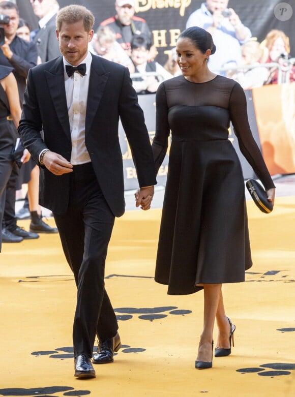 Le prince Harry, duc de Sussex, et Meghan Markle, duchesse de Sussex, à la première du film "Le Roi Lion" au cinéma Odeon Luxe Leicester Square à Londres, le 14 juillet 2019.