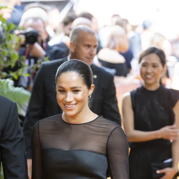 Le prince Harry, duc de Sussex, et Meghan Markle, duchesse de Sussex, à la première du film "Le Roi Lion" au cinéma Odeon Luxe Leicester Square à Londres, le 14 juillet 2019.