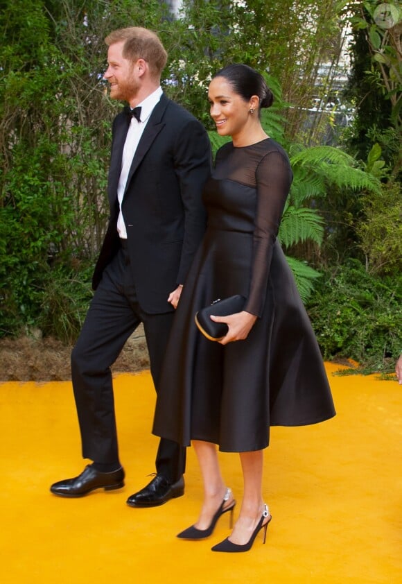 Le prince Harry, duc de Sussex, et Meghan Markle, duchesse de Sussex, à la première du film "Le Roi Lion" au cinéma Odeon Luxe Leicester Square à Londres, le 14 juillet 2019.