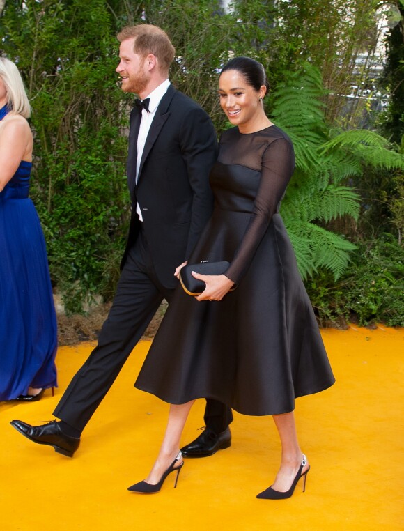 Le prince Harry, duc de Sussex, et Meghan Markle, duchesse de Sussex, à la première du film "Le Roi Lion" au cinéma Odeon Luxe Leicester Square à Londres, le 14 juillet 2019.