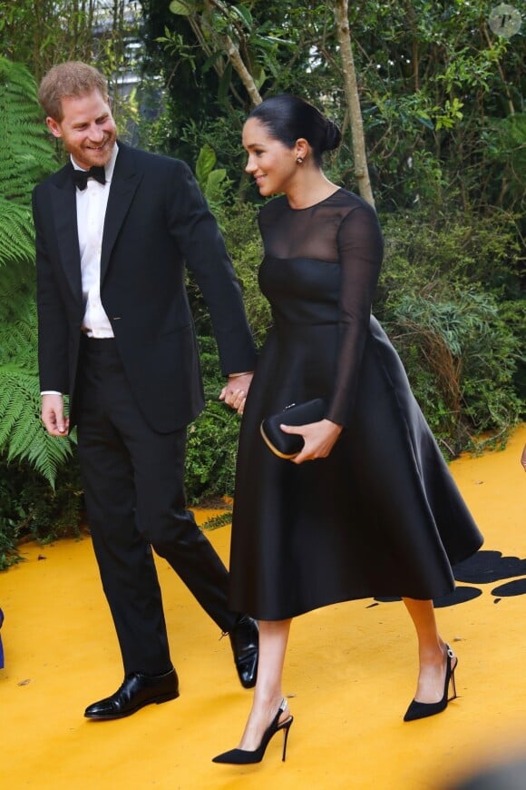 Le prince Harry, duc de Sussex, et Meghan Markle, duchesse de Sussex, à la première du film "Le Roi Lion" au cinéma Odeon Luxe Leicester Square à Londres, le 14 juillet 2019.