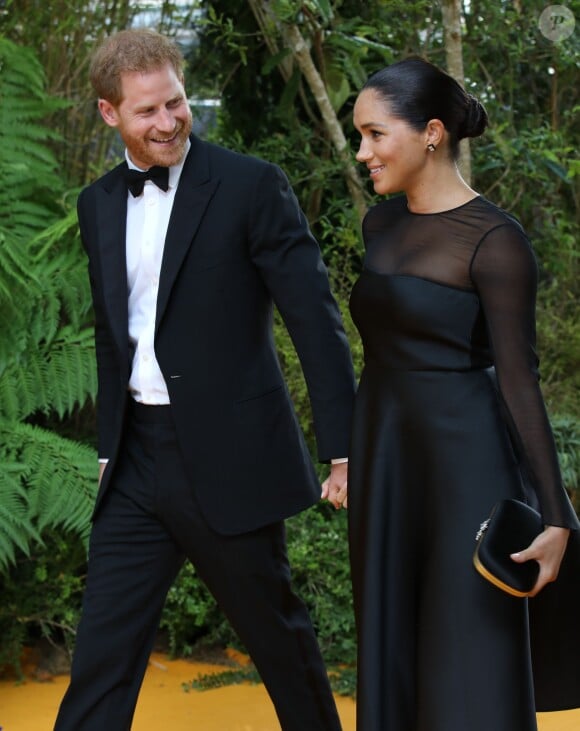 Le prince Harry, duc de Sussex, et Meghan Markle, duchesse de Sussex, à la première du film "Le Roi Lion" au cinéma Odeon Luxe Leicester Square à Londres, le 14 juillet 2019.