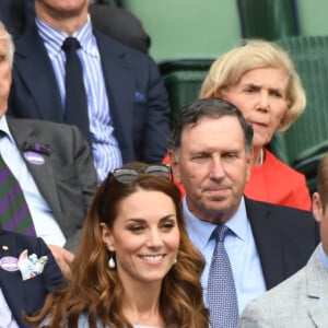 Le prince William, duc de Cambridge, et Catherine (Kate) Middleton, duchesse de Cambridge, assistent à la finale homme du tournoi de Wimbledon "Novak Djokovic - Roger Federer (7/6 - 1/6 - 7/6 - 4/6 - 13/12)" à Londres. Catherine (Kate) Middleton, duchesse de Cambridge, est venue remettre les trophées aux joueurs. Londres, le 14 juillet 2019.