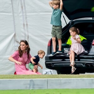 Catherine (Kate) Middleton, duchesse de Cambridge avec ses enfants, le prince George de Cambridge, la princesse Charlotte de Cambridge et le prince Louis de Cambridge lors d'un match de polo de bienfaisance King Power Royal Charity Polo Day à Wokinghan, comté de Berkshire, Royaume Uni, le 10 juillet 2019.