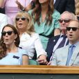 Le prince William, duc de Cambridge, et Catherine (Kate) Middleton, duchesse de Cambridge, assistent à la finale homme du tournoi de Wimbledon "Novak Djokovic - Roger Federer (7/6 - 1/6 - 7/6 - 4/6 - 13/12)" à Londres. Catherine (Kate) Middleton, duchesse de Cambridge, est venue remettre les trophées aux joueurs. Londres, le 14 juillet 2019.