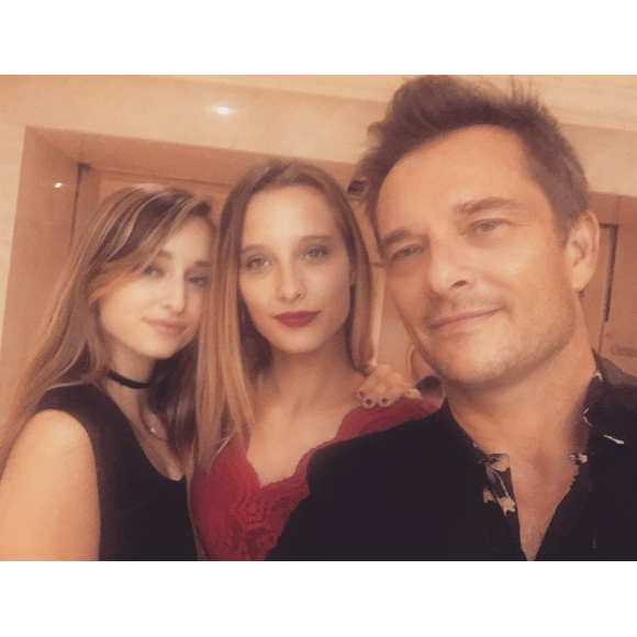 David Hallyday entouré de ses filles Ilona et Emma (septembre 2016).