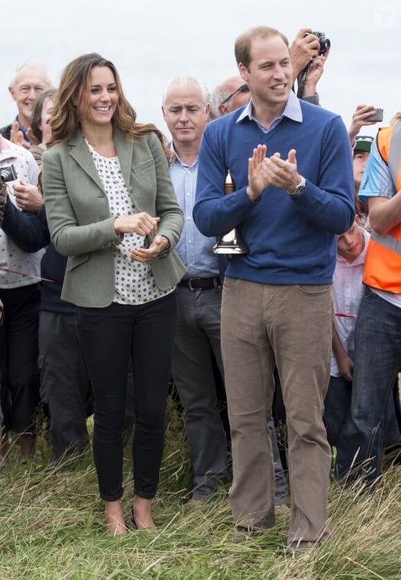 Le prince William et Kate Catherine Middleton assistent un Marathon "The Ring O'Fire " sur l' Ile d'Anglesey. Première sortie officielle de Kate après la naissance de son fils George. Le 30 Aout 2013