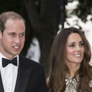 Le prince William et la duchesse de Cambridge, Kate Catherine Middleton (robe en sequins Jenny Packham) au gala de la fondation "Tusk" à Londres, le 12 septembre 2013.