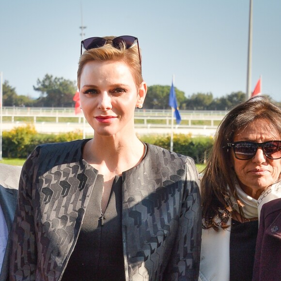 François Forcioli-Conti (président de la société des courses de la Côte d'Azur), la princesse Charlène de Monaco - La princesse Charlène de Monaco assiste au premier "Charity Mile" - une course hippique caritative rebaptisée Prix princesse Charlène de de Monaco à l'hippodrome de la Côte d'Azur de Cagnes-sur-mer le 25 février 2017 © Michael Alesi / Bestimage
