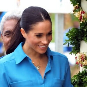 Le prince Harry et Meghan Markle au Tupou College de Tonga lors de leur tournée officielle, le 26 octobre 2018.