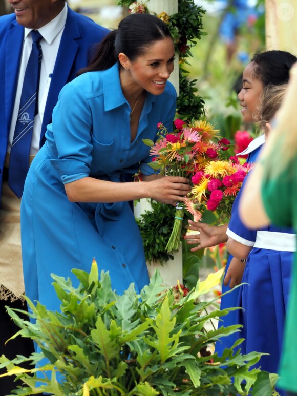 Le prince Harry et Meghan Markle au Tupou College de Tonga lors de leur tournée officielle, le 26 octobre 2018.