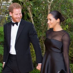 Meghan Markle, duchesse de Sussex, avec le prince Harry lors de la première du film Le Roi Lion au cinéma Odeon Luxe Leicester Square à Londres, le 14 juillet 2019.