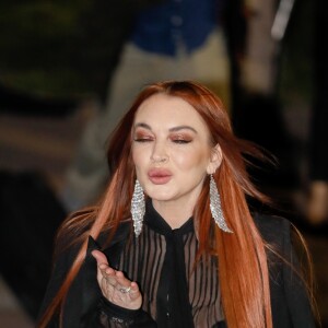 Lindsay Lohan à la sortie du défilé de mode prêt-à-porter automne-hiver 2019/2020 "Saint Laurent" à Paris le 26 février 2019.