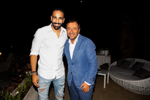 Adil Rami et Bernard Montiel assistent à la soirée des 50 ans de l'hôtel le Mas de Bellevue à Saint-Tropez, Côte d'Azur, France, le 8 août 2019. © Jack Tribeca/Bestimage