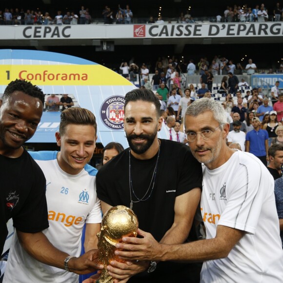 Steve Mandanda, Florian Thauvin, Adil Rami et Franck Le Gall - Match OM-Toulouse FC pour le lancement de la saison 2018/2019 du championnat de football de Ligue 1 au stade Vélodrome à Marseille. Le 10 août 2018.