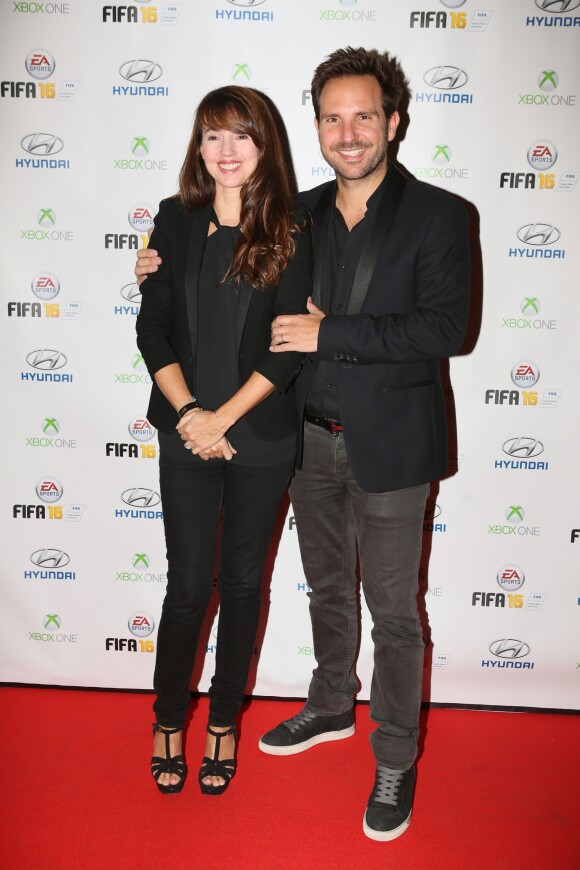Christophe Michalak et sa femme Delphine McCarty - Soirée de lancement du jeu vidéo "FIFA 2016" au Faust à Paris, le 21 septembre 2015.