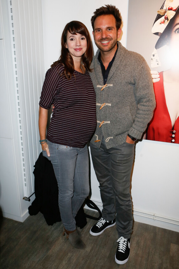 Exclusif - Christophe Michalak et son épouse Delphine McCarty, enceinte - Vernissage de l'exposition "Les filles à fromages" à la galerie Milk Factory à Paris, le 6 février 2014.