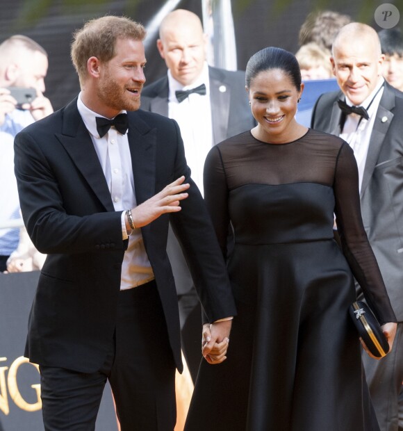 Le prince Harry, duc de Sussex, et Meghan Markle, duchesse de Sussex, à la première du film "Le Roi Lion" au cinéma Odeon Luxe Leicester Square à Londres, le 14 juillet 2019.