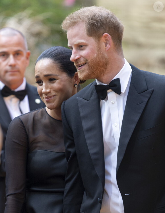 Le prince Harry, duc de Sussex, et Meghan Markle, duchesse de Sussex, à la première du film "Le Roi Lion" au cinéma Odeon Luxe Leicester Square à Londres, le 14 juillet 2019.