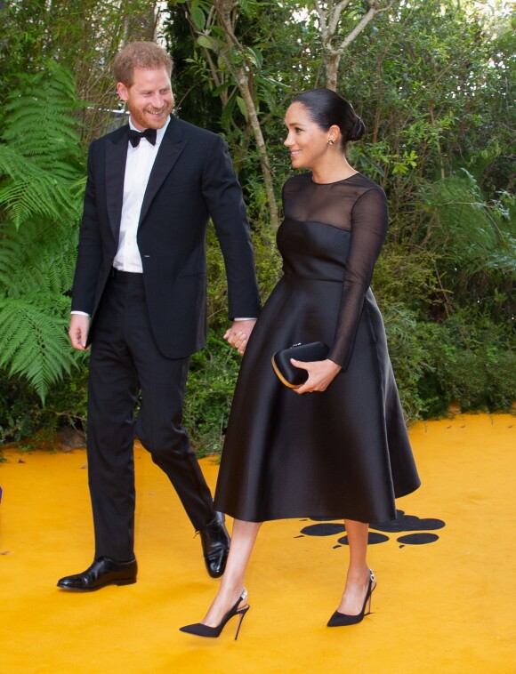 Le prince Harry, duc de Sussex, et Meghan Markle, duchesse de Sussex, à la première du film "Le Roi Lion" au cinéma Odeon Luxe Leicester Square à Londres, le 14 juillet 2019.