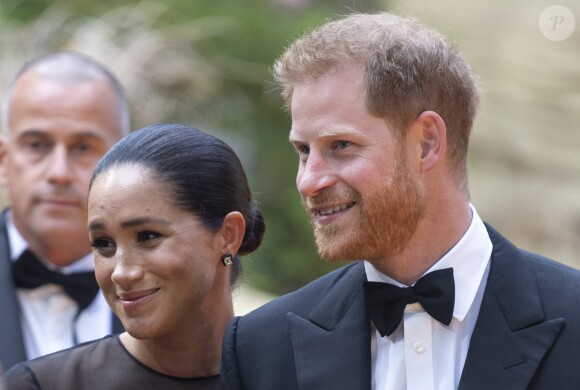 Le prince Harry, duc de Sussex, et Meghan Markle, duchesse de Sussex, à la première du film "Le Roi Lion" au cinéma Odeon Luxe Leicester Square à Londres, le 14 juillet 2019.