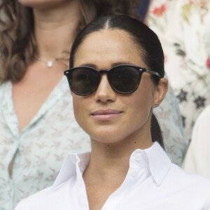 Catherine (Kate) Middleton, duchesse de Cambridge, Meghan Markle, duchesse de Sussex, et Pippa Middleton dans les tribunes lors de la finale femme de Wimbledon "Serena Williams - Simona Halep (2/6 - 2/6) à Londres, le 13 juillet 2019. © Ray Tang/London