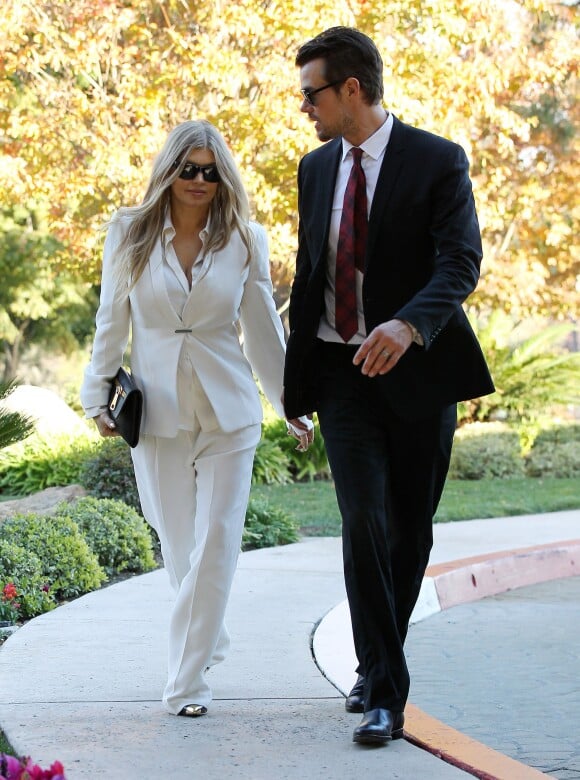La chanteuse Fergie et son mari Josh Duhamel au Mountain Gate Country Club apres le bapteme de leur fils Axl Jack a Bel Air, le 12 decembre 2013.