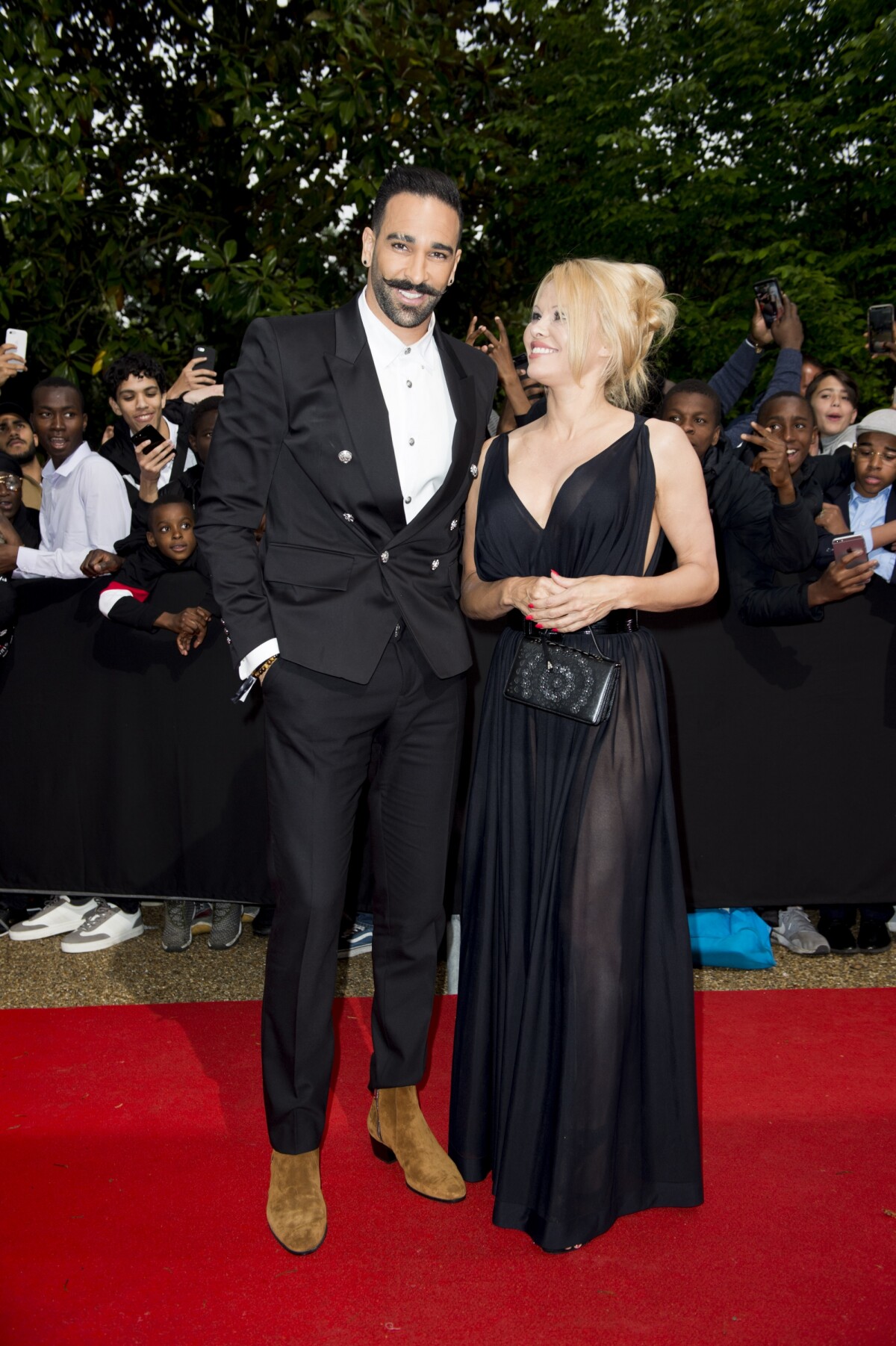 Photo : Adil Rami et sa compagne Pamela Anderson arrivent à la 28ème ...