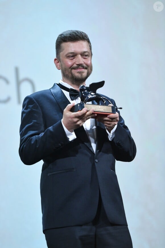 Valentyn Vasyanovych (Prix Orizzonti du Meilleur film pour "Atlantis") sur scène lors de la cérémonie de clôture du 76ème Festival International du Film de Venise (Mostra), le 7 septembre 2019.