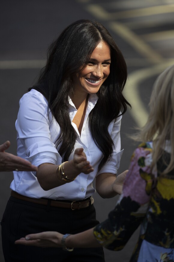 Meghan Markle, duchesse de Sussex arrive au magasin John Lewis sur Oxford Street pour le lancement de sa collection capsule Smart Works à Londres, le 12 septembre 2019.