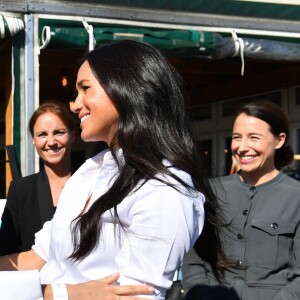 Meghan Markle, duchesse de Sussex, est au magasin John Lewis sur Oxford Street pour le lancement de sa collection capsule Smart Works à Londres le 12 septembre 2019.