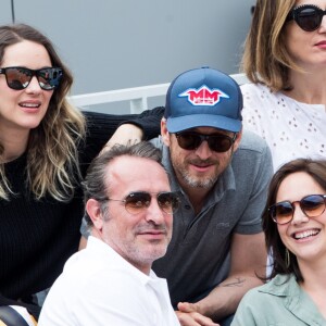 Marion Cotillard et son compagnon Guillaume Canet, Jean Dujardin et sa femme Nathalie Péchalat - People dans les tribunes lors de la finale messieurs des internationaux de France de tennis de Roland Garros 2019 à Paris le 9 juin 2019. © Jacovides-Moreau/Bestimage