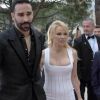 Pamela Anderson et Adil Rami lors de la soirée Amber Lounge Monaco 2019 au profit de la fondation de Jackie Stewart "Race Against Dementia" à l'hôtel Méridien Beach Plaza à Monaco, le 24 mai 2019.