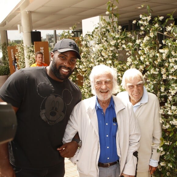 Teddy Riner, Jean-Paul Belmondo, Charles Gérard au village lors des internationaux de tennis de Roland Garros à Paris le 8 juin 2018. © Christophe Aubert via Bestimage  Celebs attend french open Roland Garros in Paris on june 8th 201808/06/2018 - Paris
