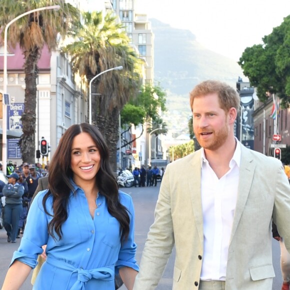 Le prince Harry, duc de Sussex, et Meghan Markle, duchesse de Sussex, en visite dans le District 6 au Cap dans le cadre de leur visite officielle en Afrique du Sud, le 23 septembre 2019.