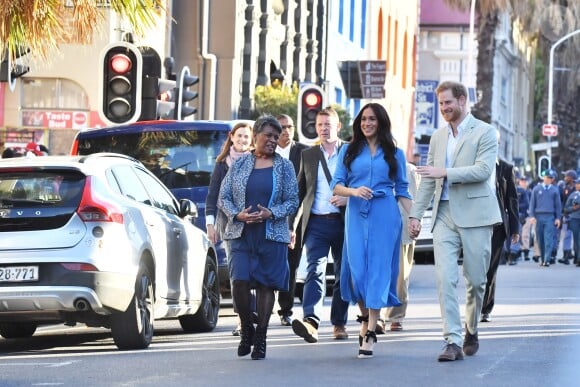 Le prince Harry, duc de Sussex, et Meghan Markle, duchesse de Sussex, en visite du Musée du Distric 6 au Cap dans le cadre de leur visite officielle en Afrique du Sud, le 23 septembre 2019.