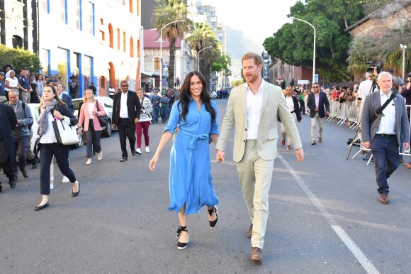Le prince Harry, duc de Sussex, et Meghan Markle, duchesse de Sussex, en visite dans le District 6 au Cap dans le cadre de leur visite officielle en Afrique du Sud, le 23 septembre 2019.