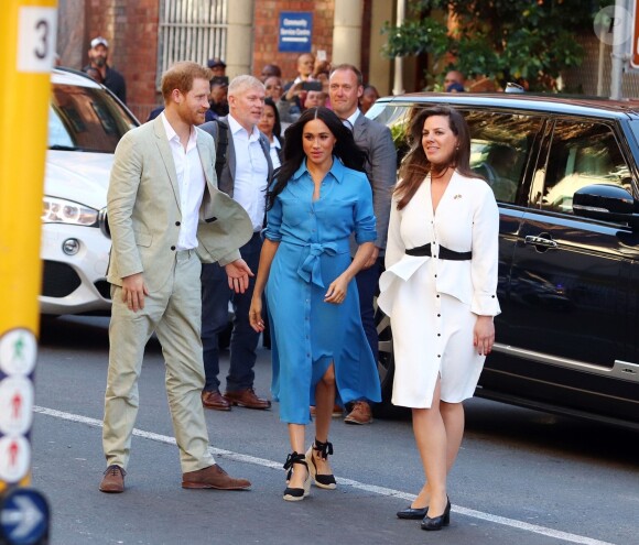 Le prince Harry, duc de Sussex, et Meghan Markle, duchesse de Sussex, en visite dans le District 6 au Cap dans le cadre de leur visite officielle en Afrique du Sud, le 23 septembre 2019.
