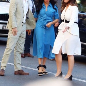 Le prince Harry, duc de Sussex, et Meghan Markle, duchesse de Sussex, en visite dans le District 6 au Cap dans le cadre de leur visite officielle en Afrique du Sud, le 23 septembre 2019.