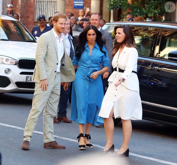 Le prince Harry, duc de Sussex, et Meghan Markle, duchesse de Sussex, en visite dans le District 6 au Cap dans le cadre de leur visite officielle en Afrique du Sud, le 23 septembre 2019.