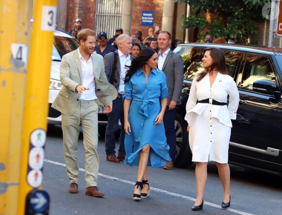 Le prince Harry, duc de Sussex, et Meghan Markle, duchesse de Sussex, en visite dans le District 6 au Cap dans le cadre de leur visite officielle en Afrique du Sud, le 23 septembre 2019.
