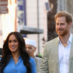 Le prince Harry, duc de Sussex, et Meghan Markle, duchesse de Sussex, en visite dans le District 6 au Cap dans le cadre de leur visite officielle en Afrique du Sud, le 23 septembre 2019.