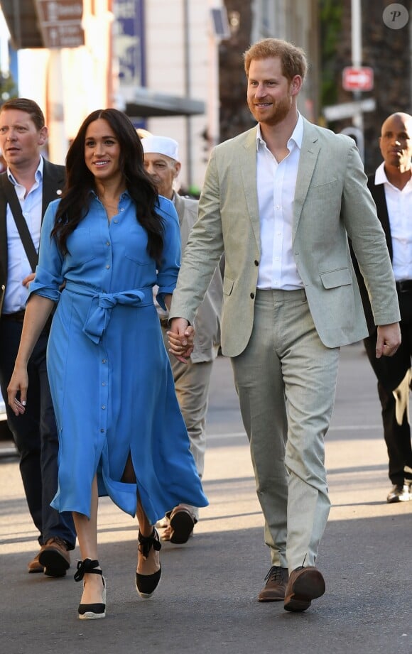 Le prince Harry, duc de Sussex, et Meghan Markle, duchesse de Sussex, en visite dans le District 6 au Cap dans le cadre de leur visite officielle en Afrique du Sud, le 23 septembre 2019.